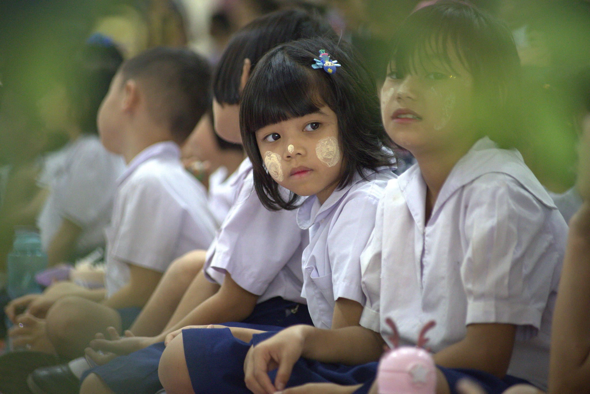 Young learners attending a school gathering Photo 1